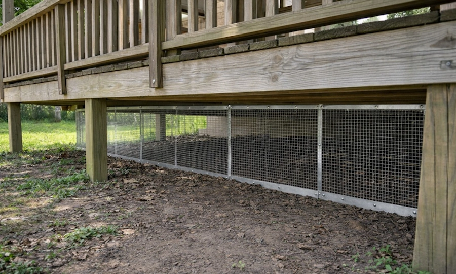 after barrier installed to block opossum access under deck in galveston 409.740.2666